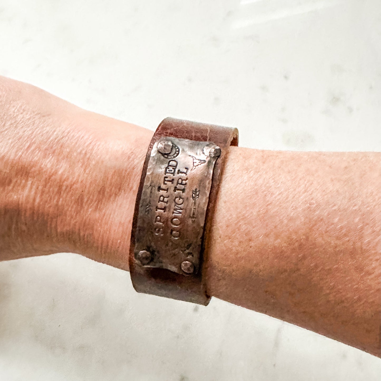 Cuff bracelet with Spirited Cowgirl tag