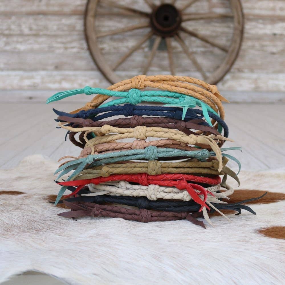 Pile of colorful braided ropes.