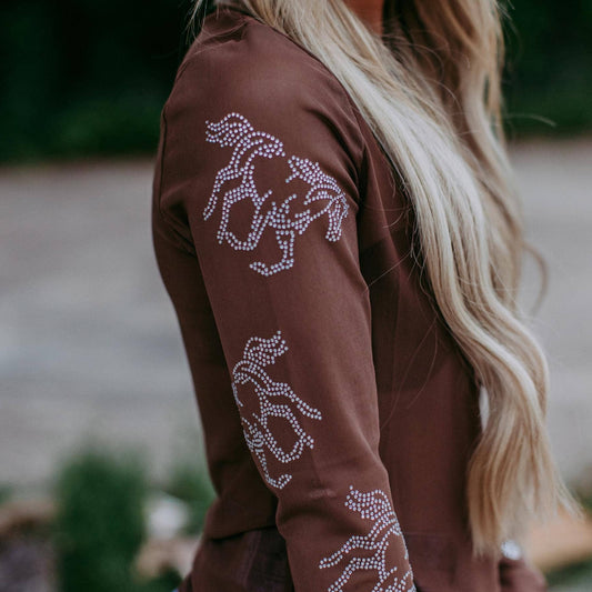 Brown jacket with horse designs on the sleeve.