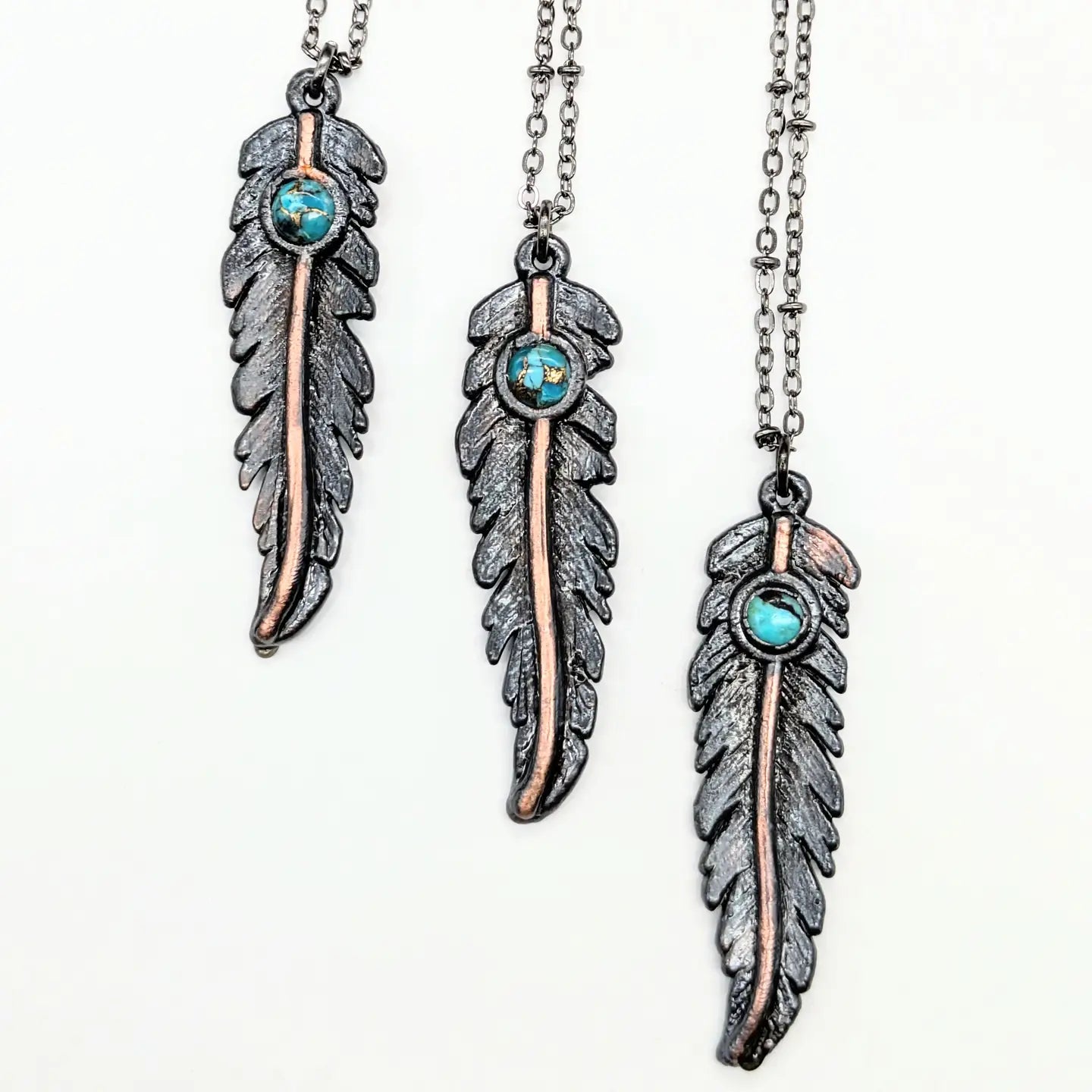 Feather pendant necklaces with turquoise accents
