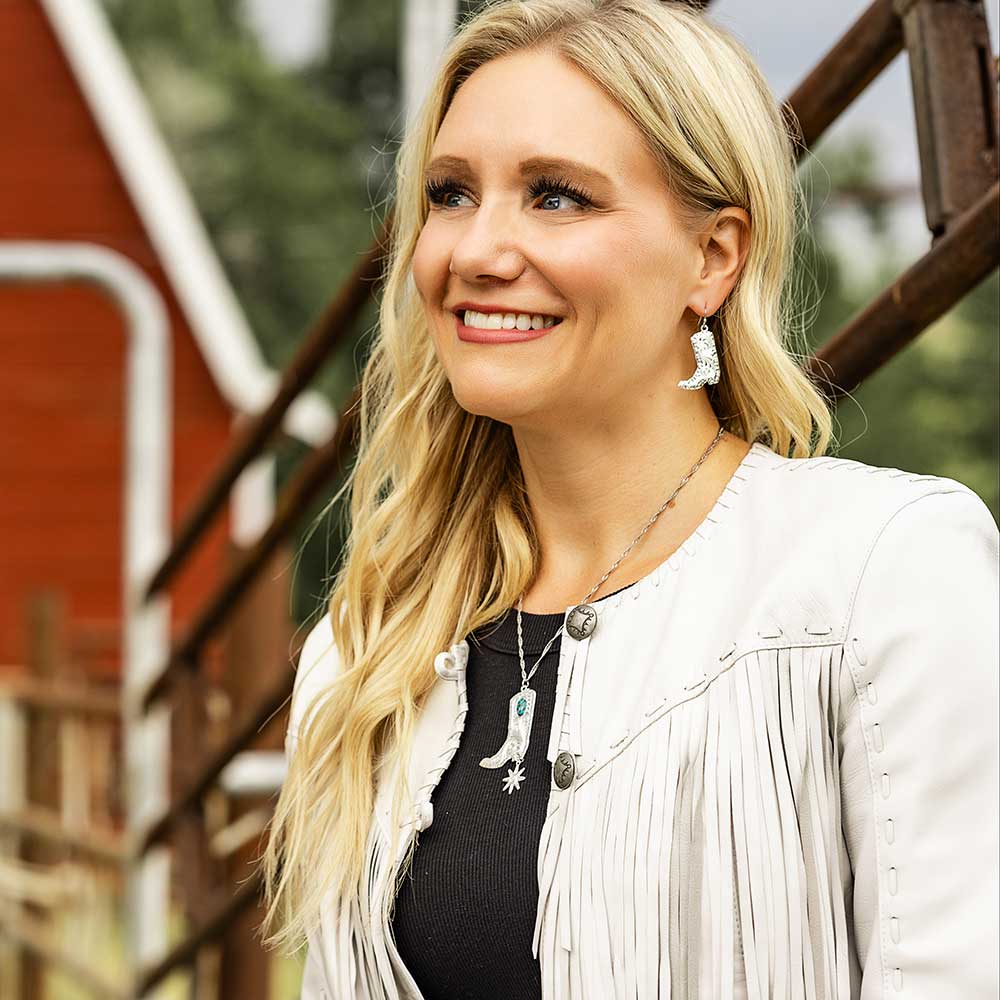 Woman with cowboy boot jewelry, e-bynder-ER5668_mod