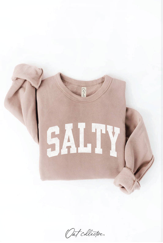 Pink sweatshirt with SALTY text.