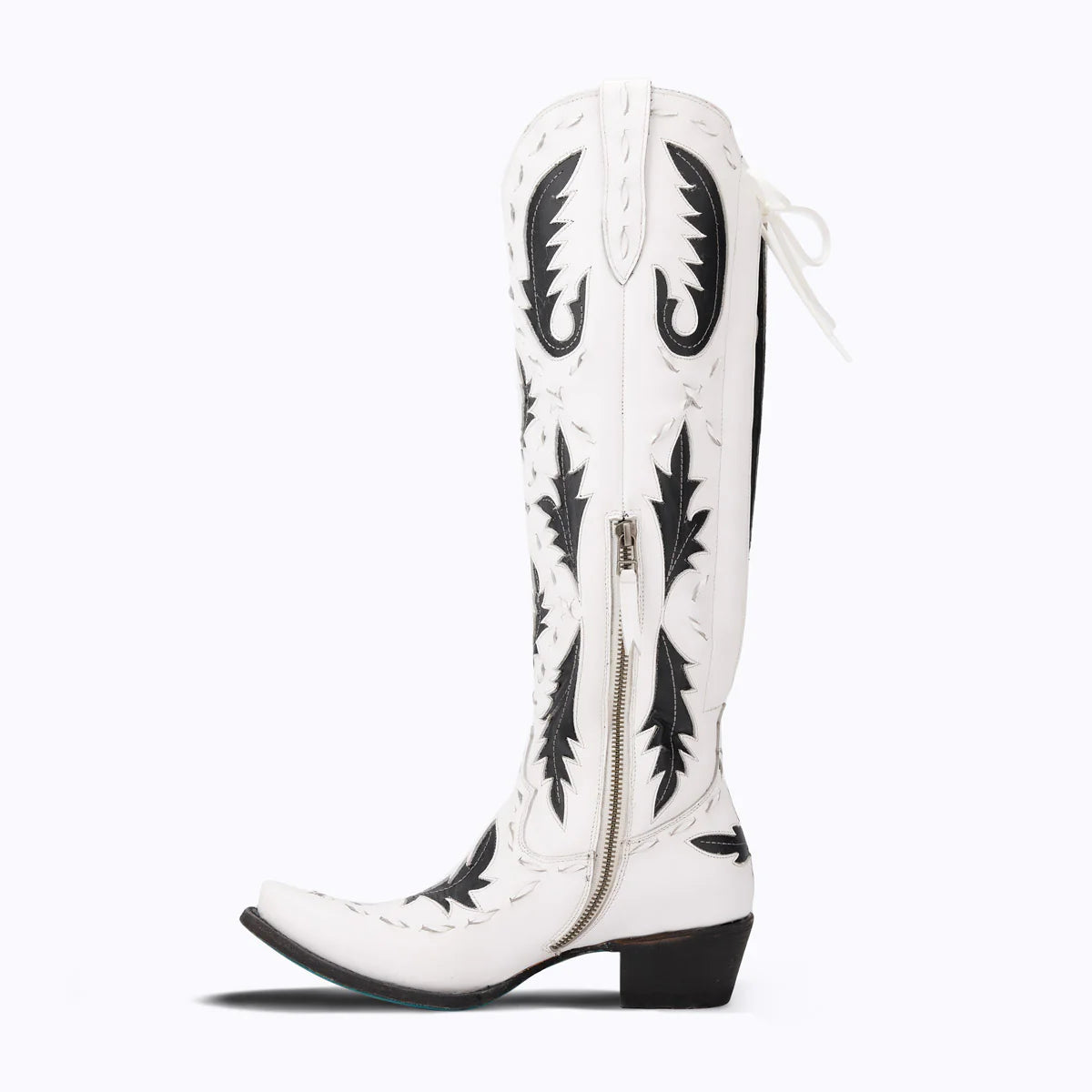 White and black cowboy boot from Reverie newsprint