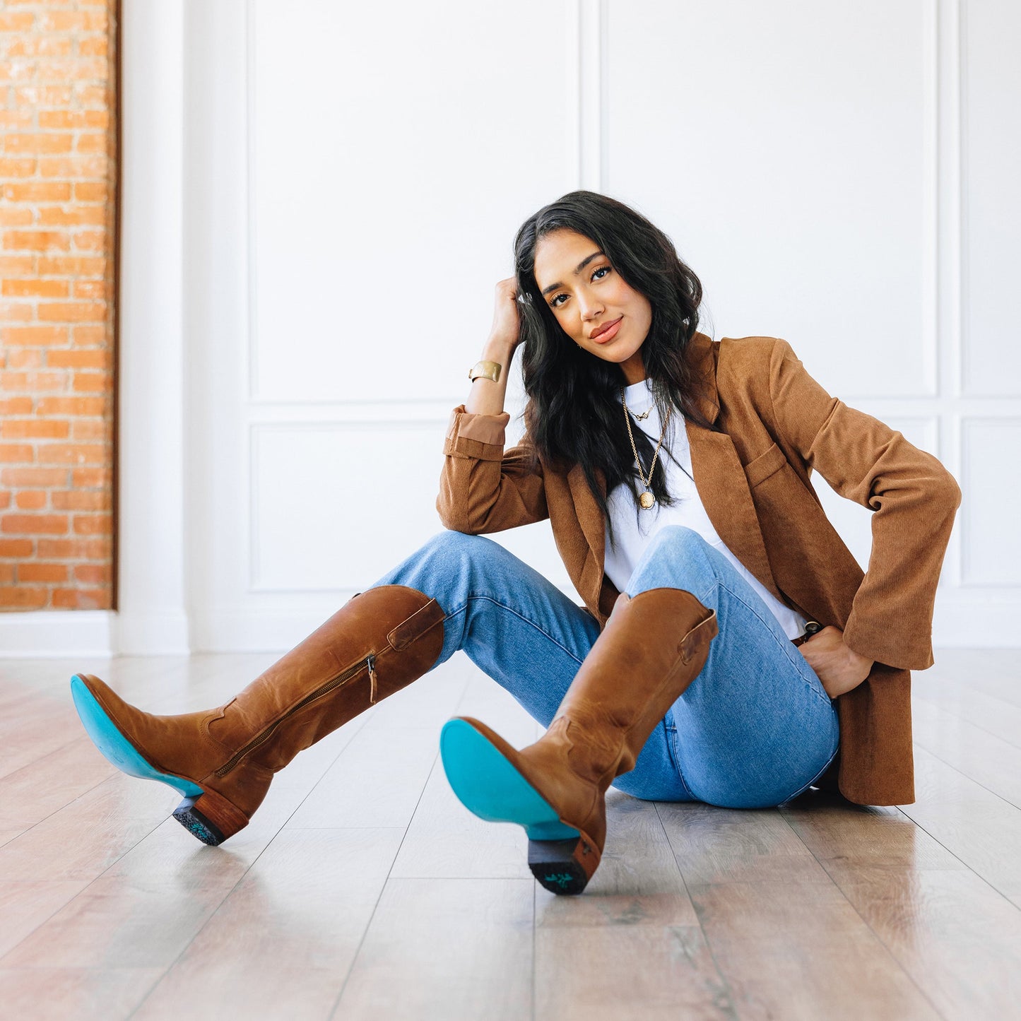 Woman wearing Plain Jane Desert Clay boots