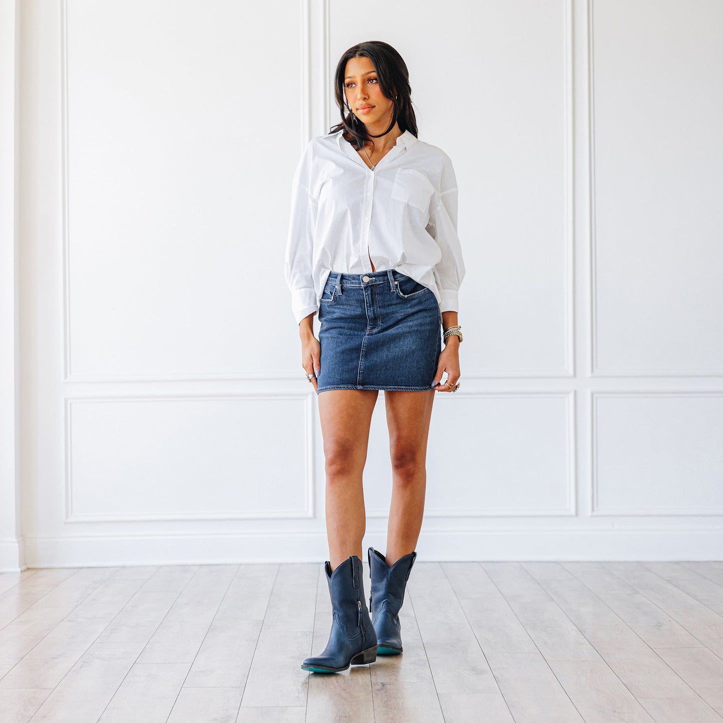 Midnight Navy denim mini skirt with white shirt and boots