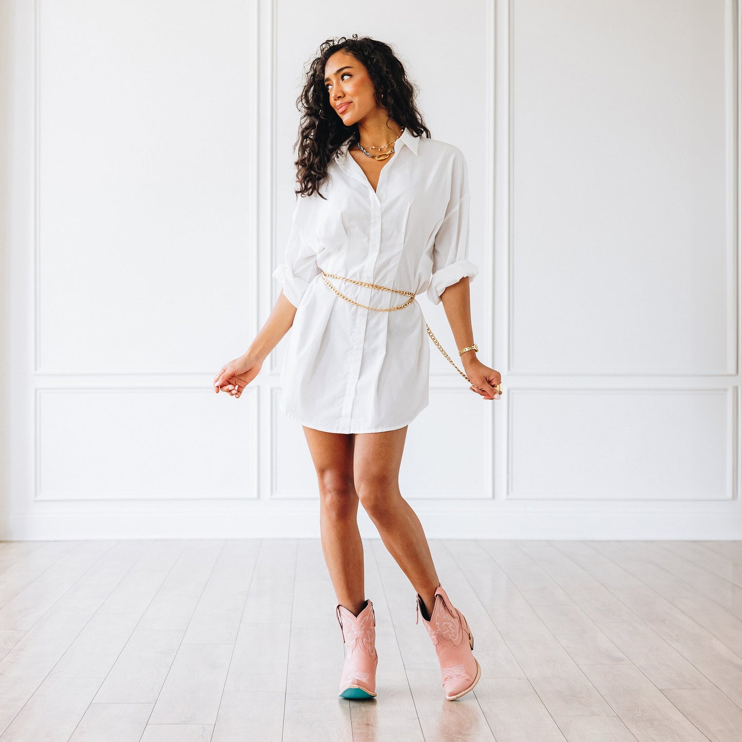 Woman in white dress and blush booties