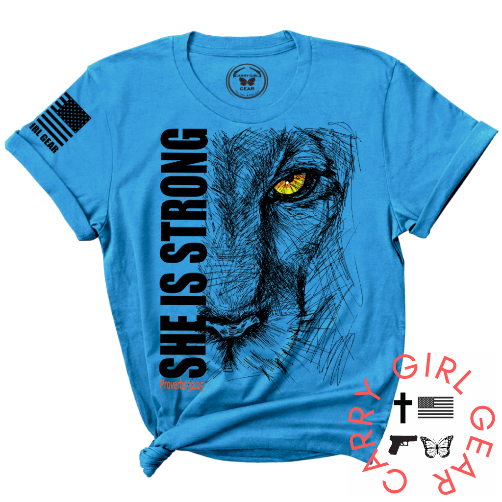 Turquoise She is Strong unisex tee with lioness.