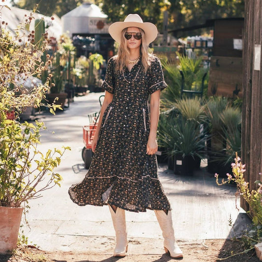 Woman shopping in floral dress and hat