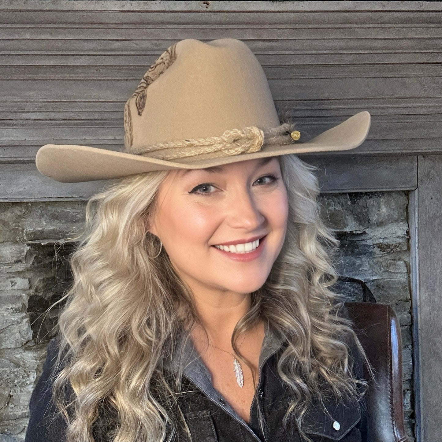 Woman in tan cowboy hat