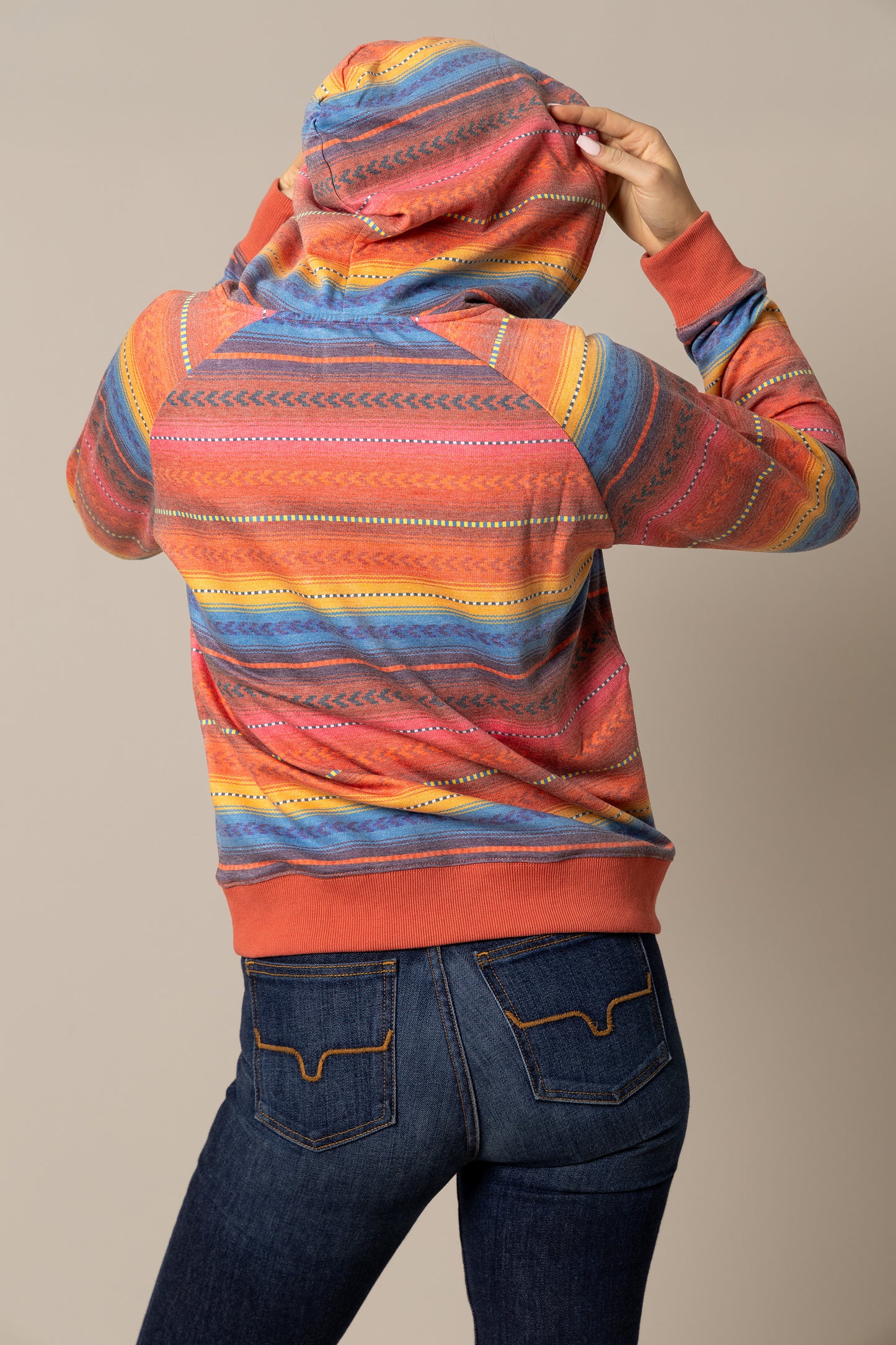 Striped hoodie with blue jeans