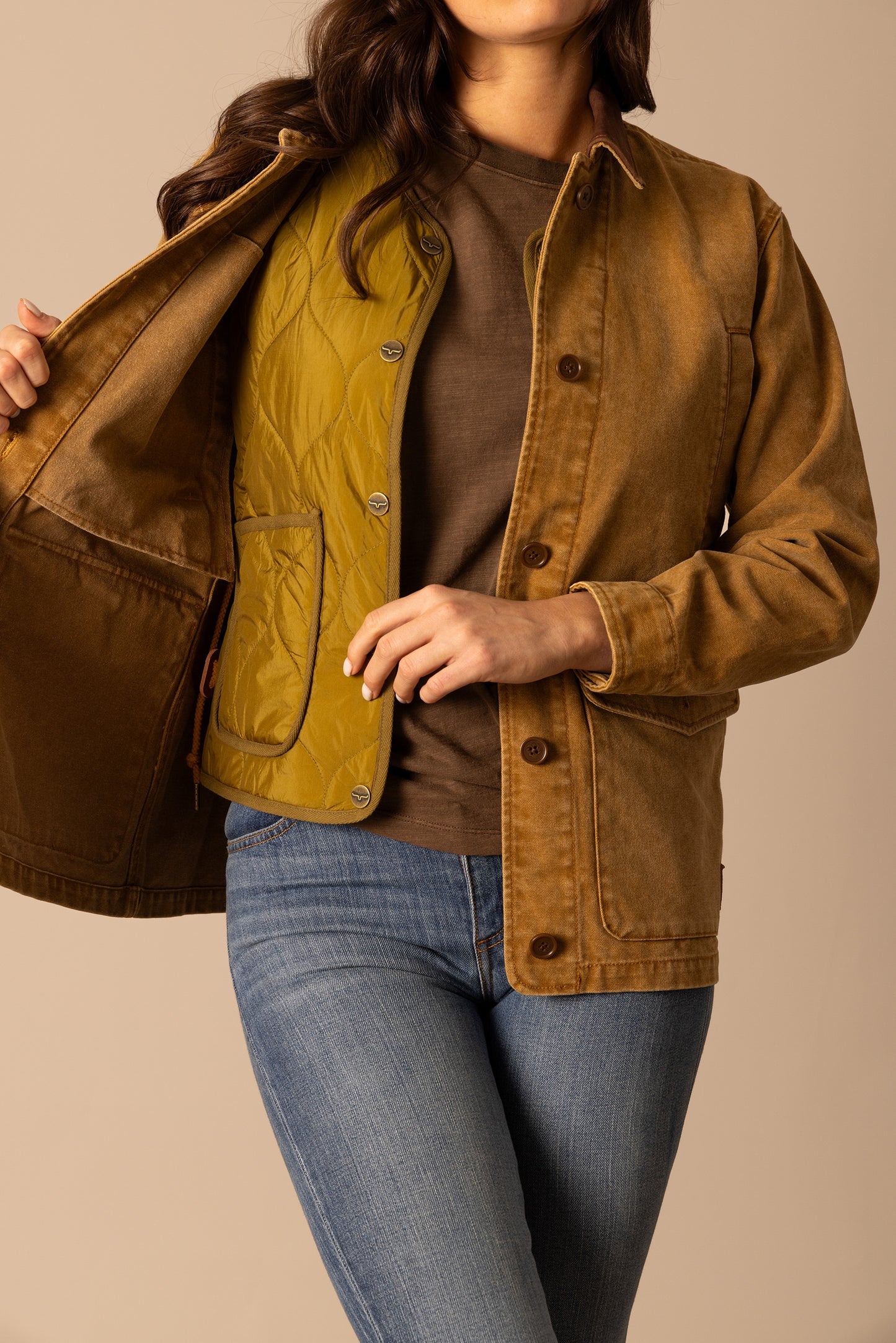 Woman in brown jacket and quilted vest - unnamed-172