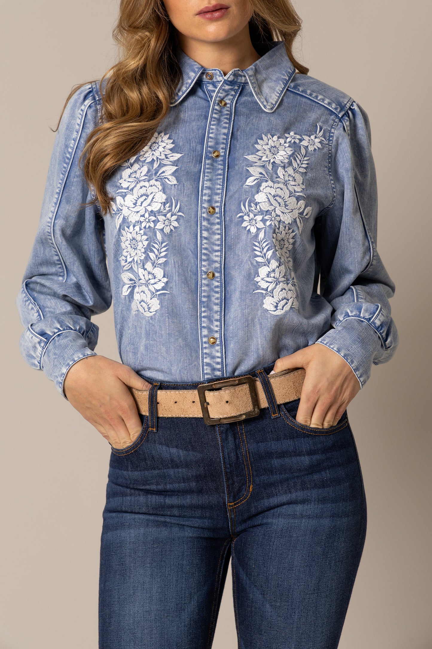 Woman in denim shirt with floral embroidery, unnamed-187