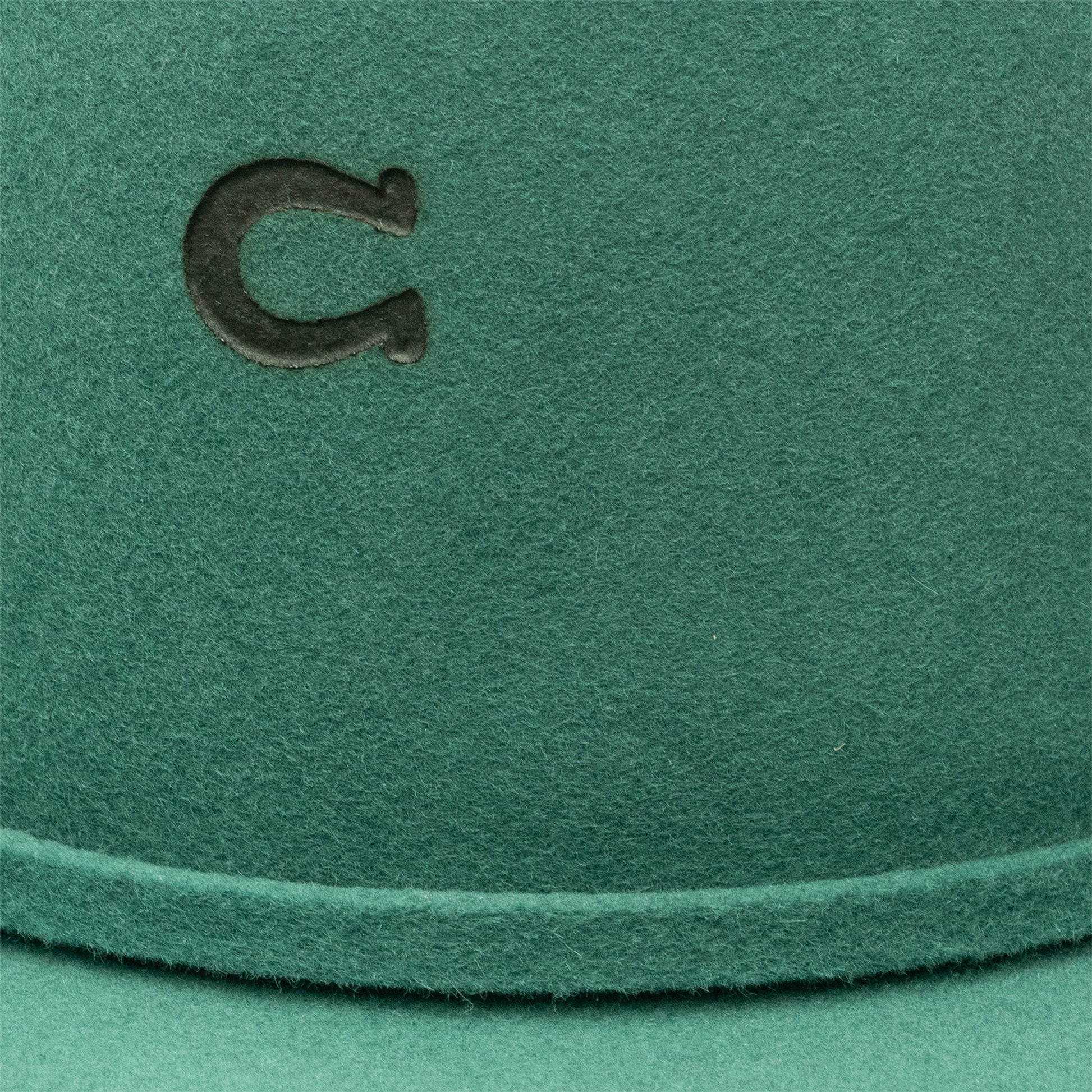 Green hat detail with C logo, unnamed-257