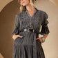 Woman in denim dress and hat,...