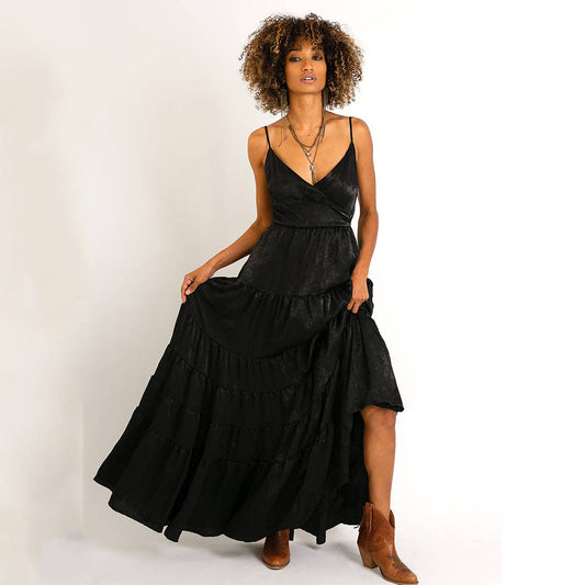 Woman in black maxi dress with boots