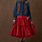 Woman in Country Club Jacket and red skirt