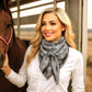 Woman with horse wearing silk scarf