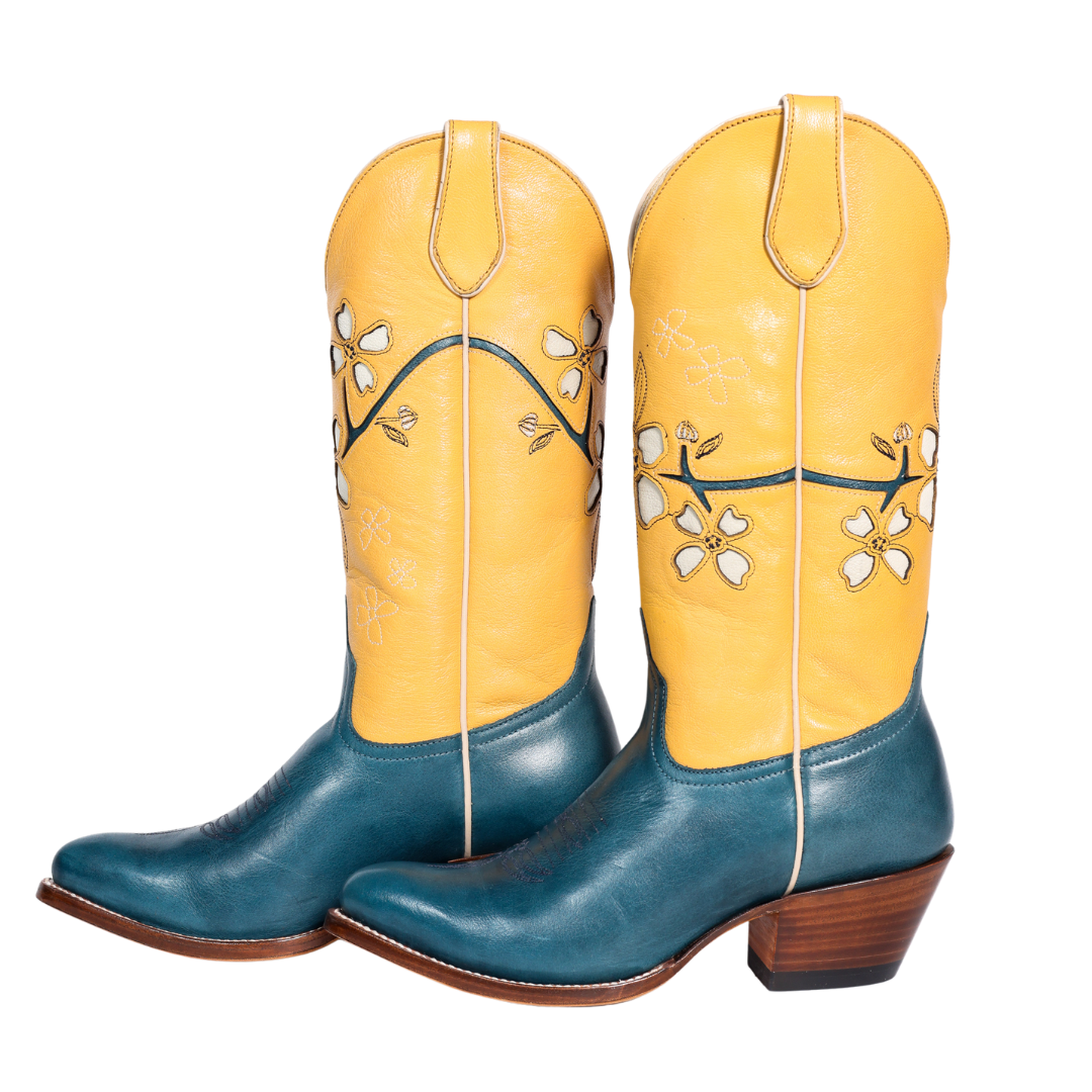 Yellow and teal cowboy boots with floral design