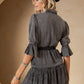 Woman in gray dress and hat, fashion style photo