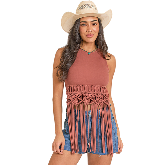 Woman in fringe top and cowboy hat