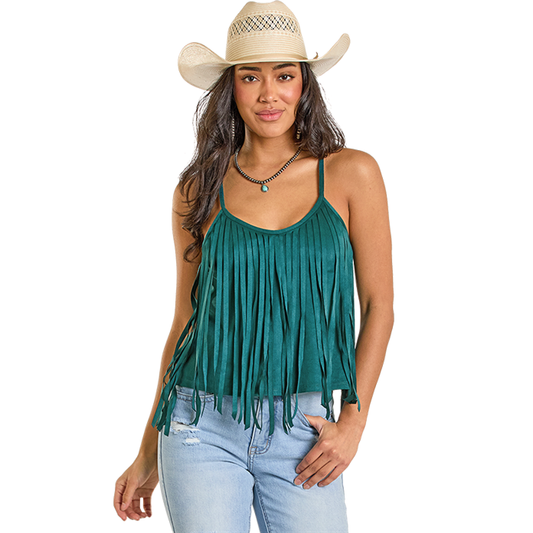 Cowgirl in green fringe top and hat.