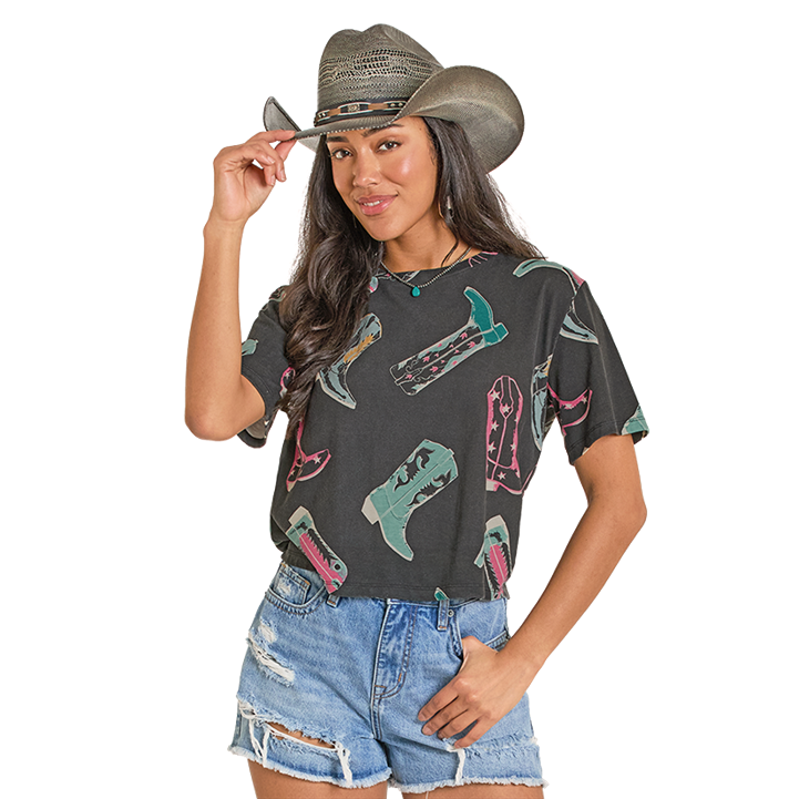 Woman in cowboy hat and boots shirt