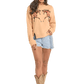 Woman in cowboy boots and horse sweatshirt