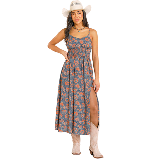 Cowgirl in floral dress and boots