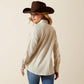 Woman in warm Western shirt and cowboy hat