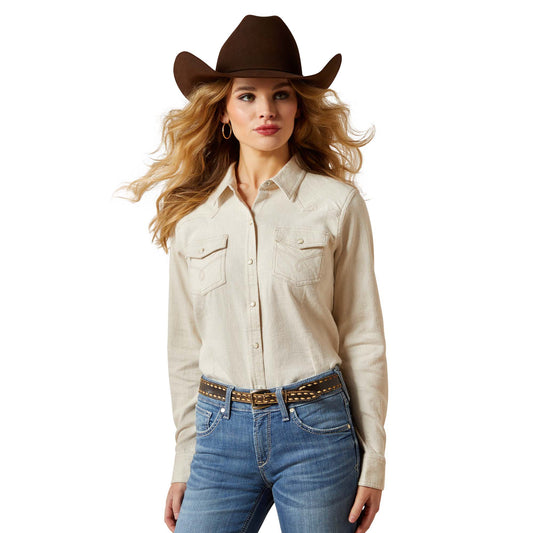Woman in western shirt and cowboy hat