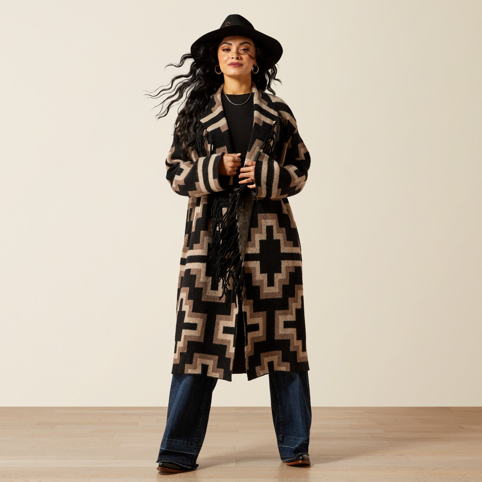 Woman in warm patterned coat and hat