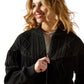 Woman in black fringe jacket