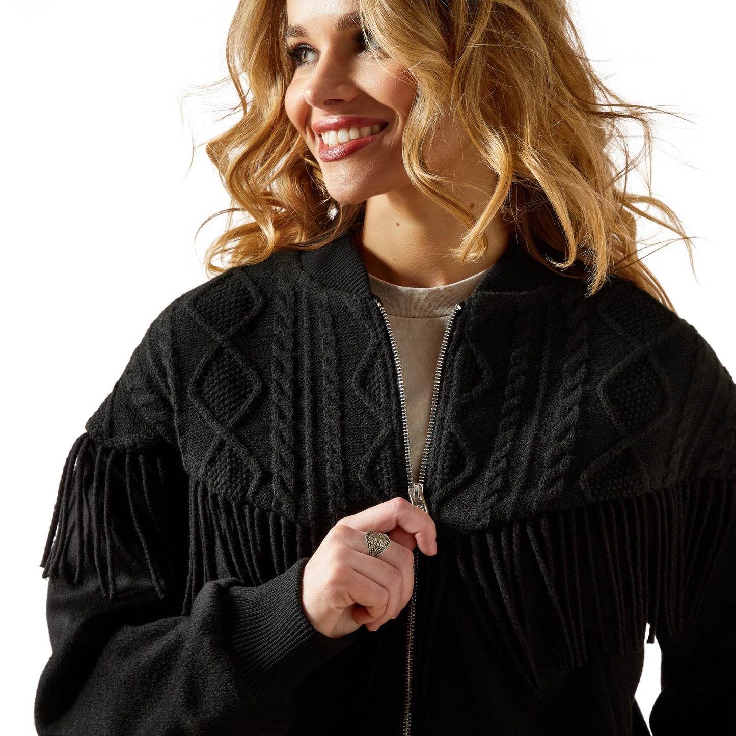 Woman in black fringe jacket