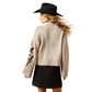 Woman in sweater & hat, F25_WMS_WEST_10065989_back view