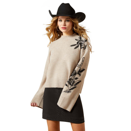 Woman in beige sweater, black skirt and cowboy hat (F25_WMS_WEST_10065989_front)