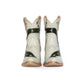 White cowboy boots with green accents