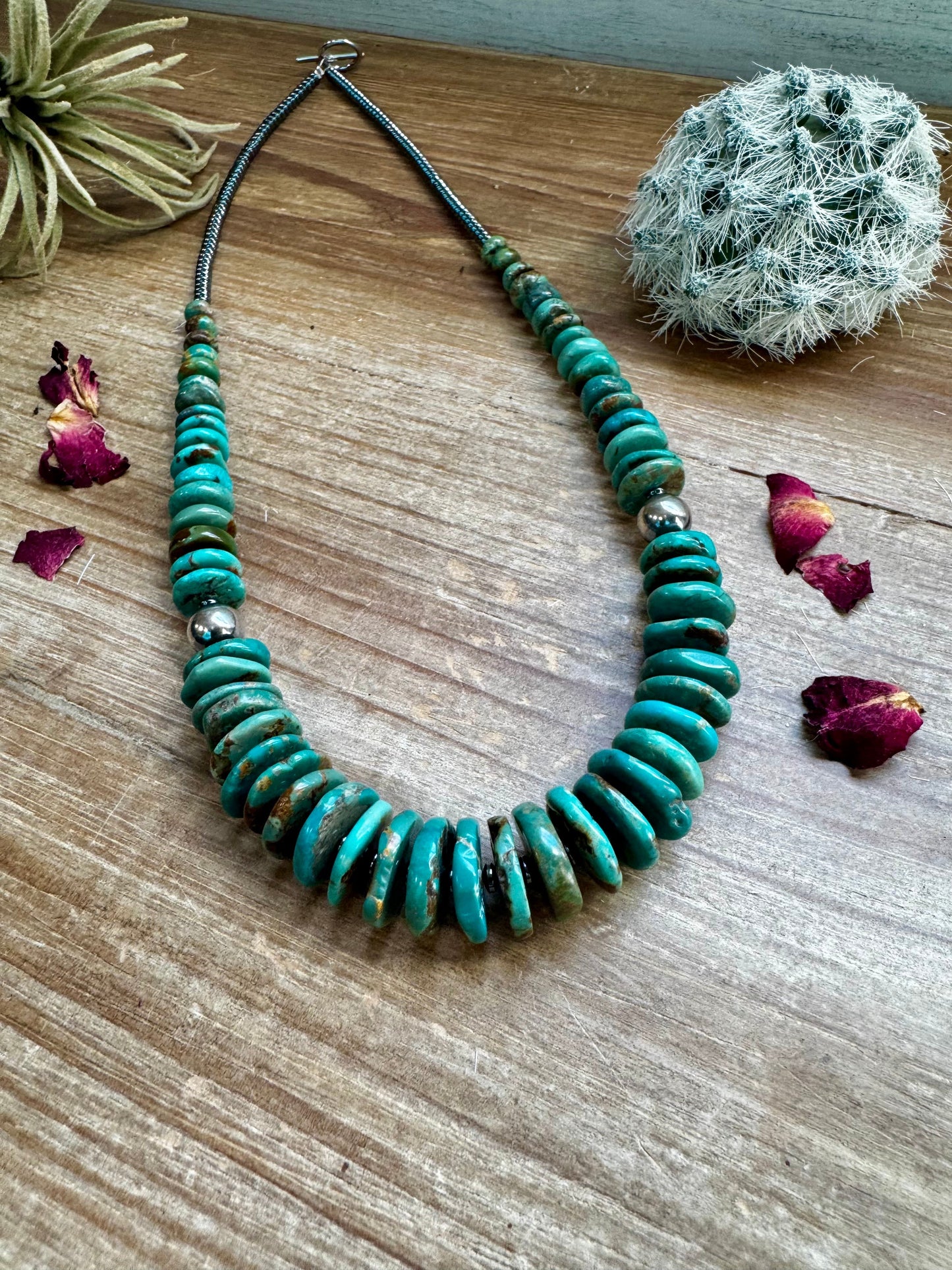 22 inch greener graduated turquoise necklace with Sterling silver pearls