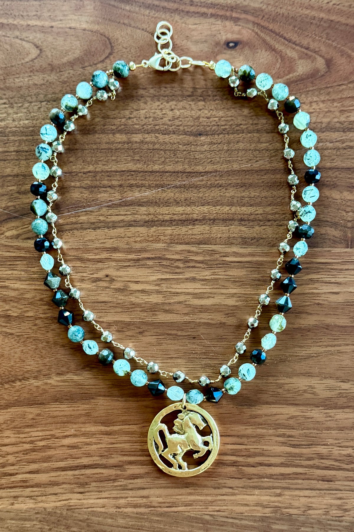 Green Gemstone Necklace with Gold Horse Medallion by Michele Busch