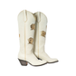White cowboy boots with gold rose details.