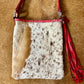 Hand Made Cowhide and Red Leather Purse at Bourbon Cowgirl