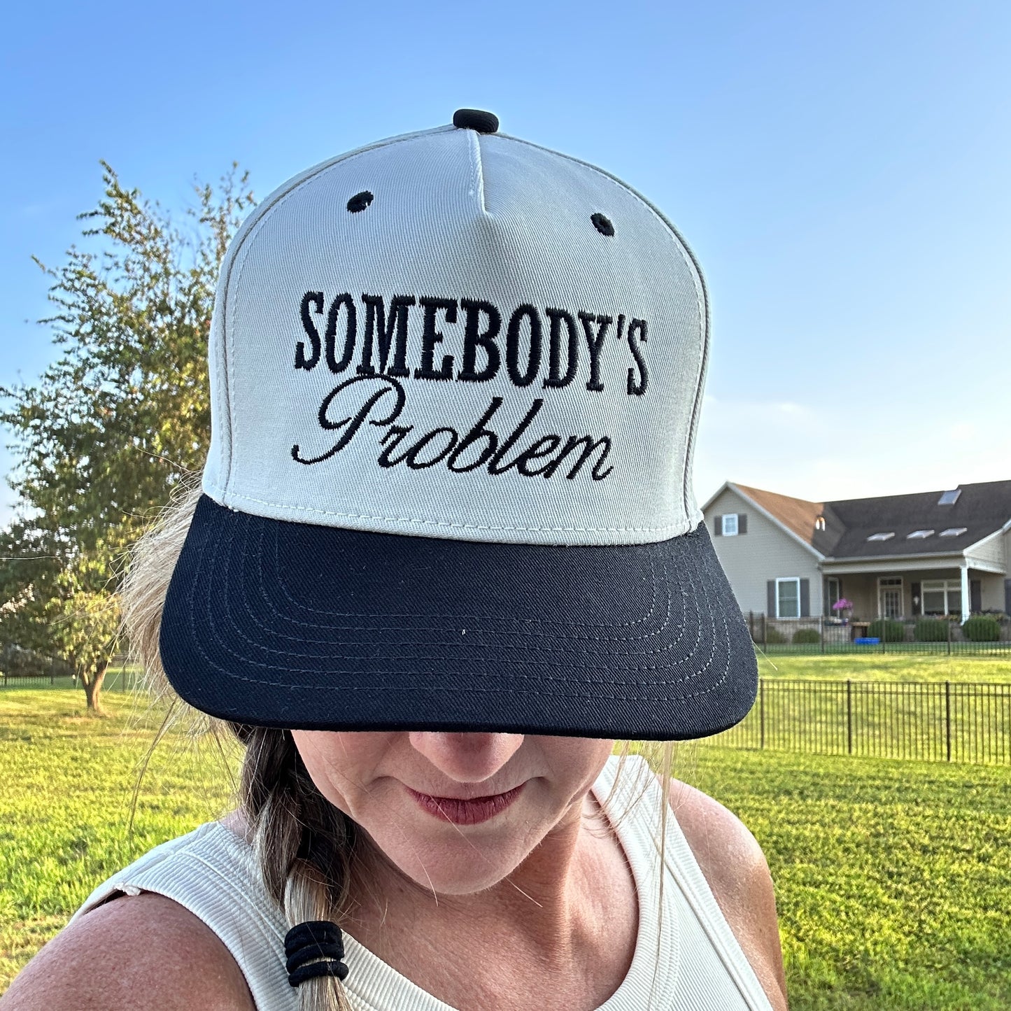 Somebody's Problem Snapback Hat