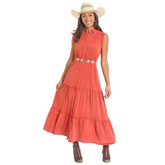 Woman in coral maxi dress and cowboy hat