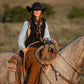Cowgirl on horseback with rope