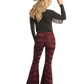 Woman in flared pants and hat (RRWD7PR0FN)