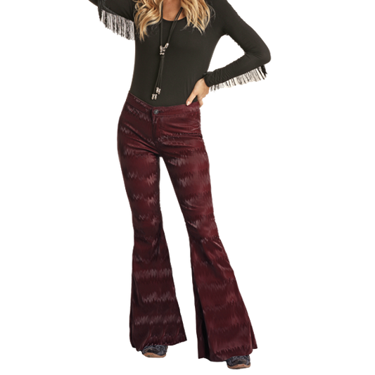 Woman wearing burgundy patterned flare pants