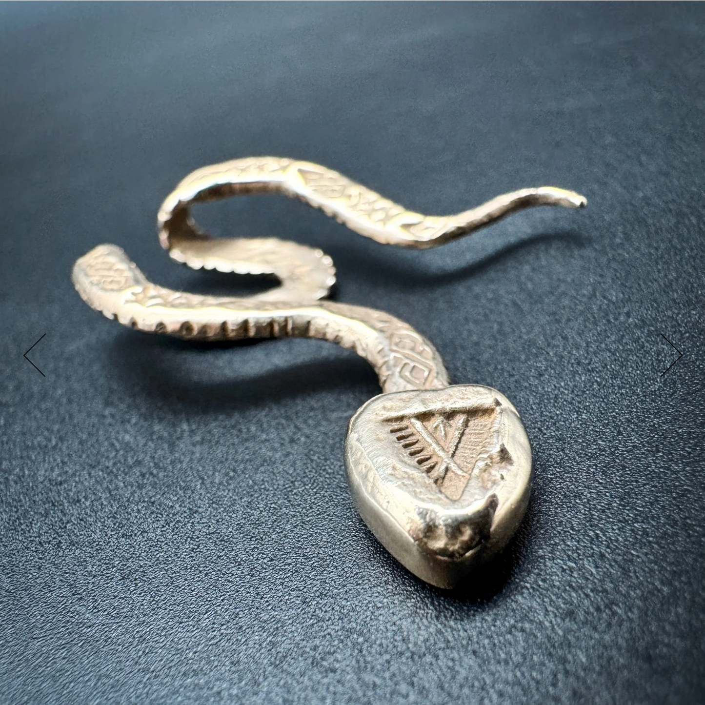 Ancient Bronze Brim Biter by Hallett Peak - Snake