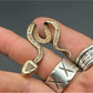 Ancient Bronze Brim Biter by Hallett Peak - Snake