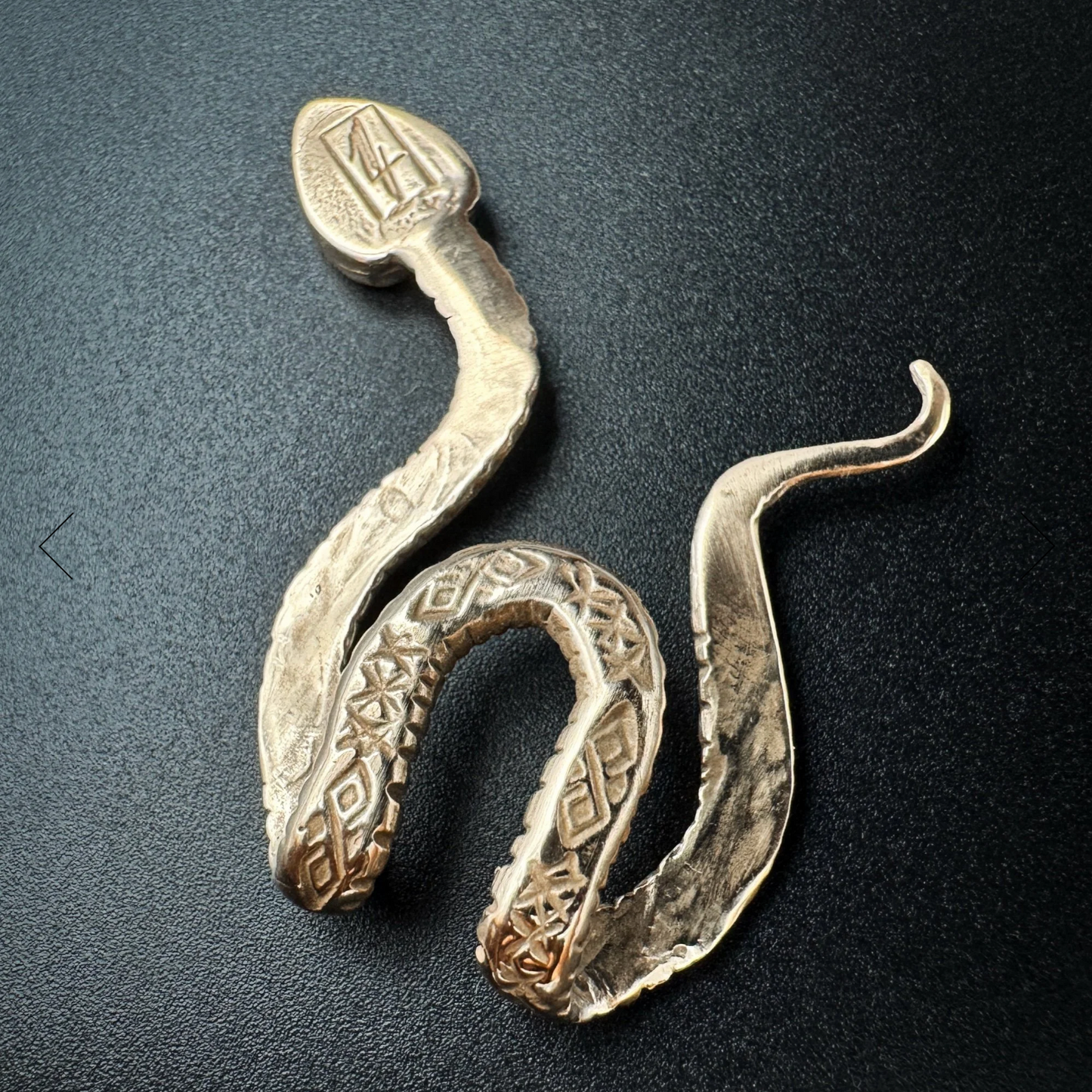 Ancient Bronze Brim Biter by Hallett Peak - Snake