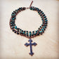 Necklace with a cross pendant.
