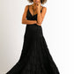 Woman in black maxi dress.